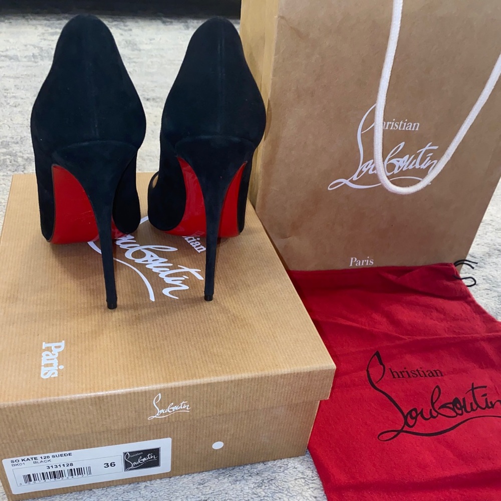 Black Christian Louboutin red bottom heels